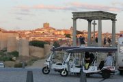 Two tuk tuks stoped at Cuatro Postes Viewpoint during the sunset