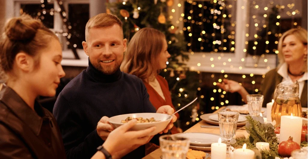 Several people having a company christmas dinner