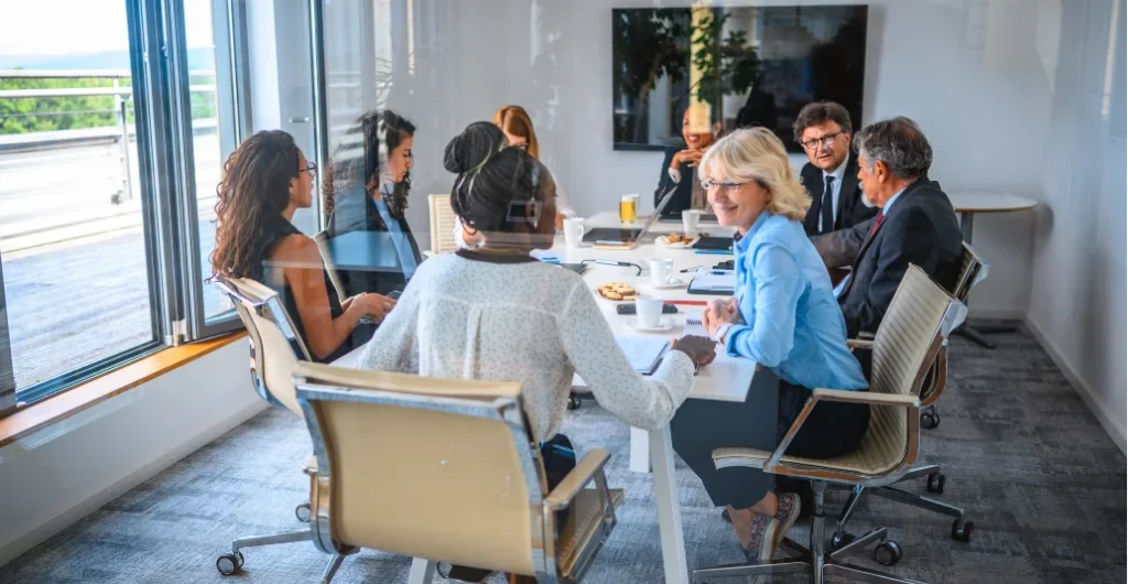 Several people in a meeting room