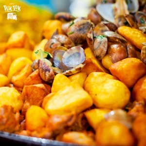 carne de porco a alentejana a traditional portuguese food